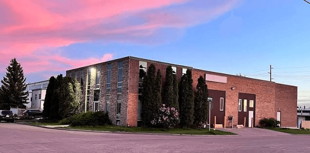 Hazrat Bilal Islamic Centre exterior in Calgary at sunset